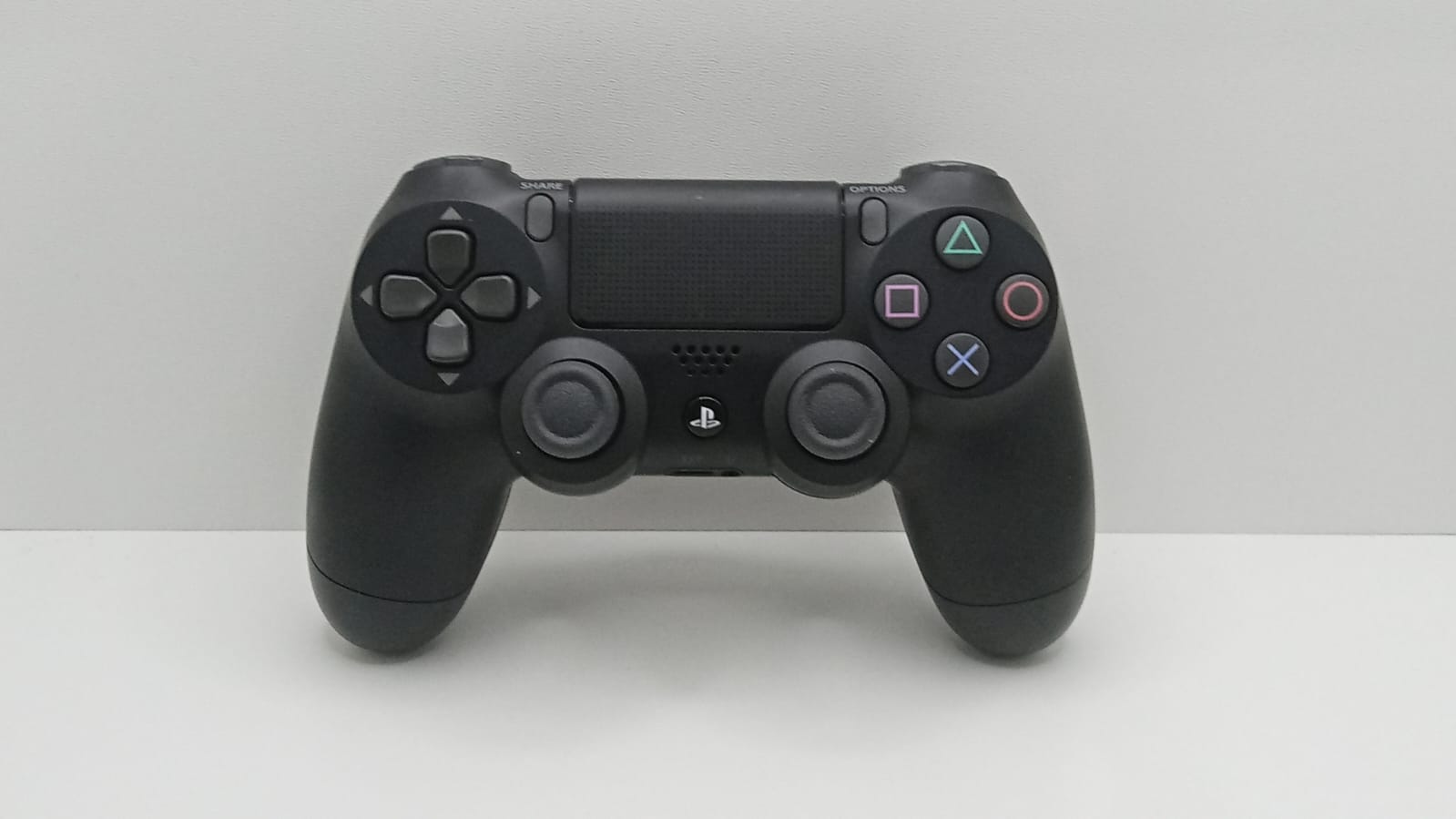 kontroler bezprzewodowy Dualshock 4 PlayStation 4 PS4 - czarny - SONY® - wyczyszczony i odnowiony